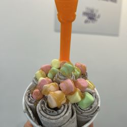 Sky Roll Ice Cream - Cookies & cream with tiny marshmallows and caramel sauce