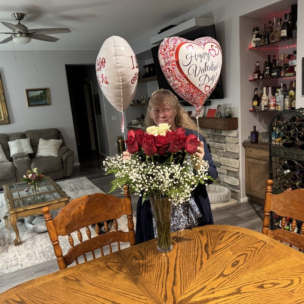 Abys Flower Shop - 15 longstem roses, two Long stem, white roses and two balloons. This is what I ordered!! - Florists Near Me - Orange, California