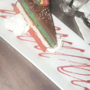 Drifters Kitchen and Bar - Rainbow Cookie Cheesecake (sorry it's a screenshot) - Cocktail Bars Near Me - Ridge, New York
