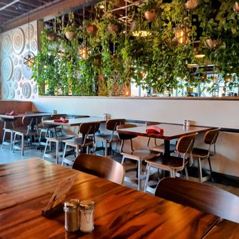 Acova - Beautiful decorated separating two large rooms fronted by Windows - New American Near Me - Denver, Colorado