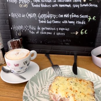 Almazen - Ham & cheese breakfast sandwich with melted cheese on top with an espresso - Cafeteria Near Me - Seville, SE