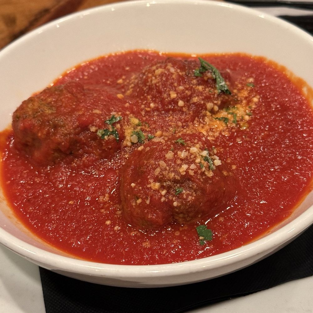 Side of meatballs. The sauce is tasty! Not sweet.
