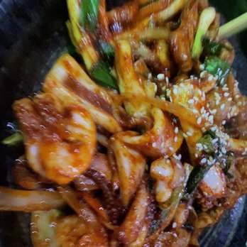 Tig Kitchen and Bar - a plate of food - Korean Near Me - Seattle, Washington