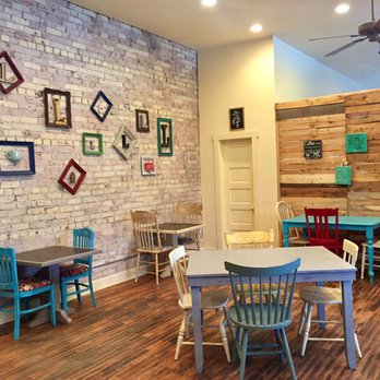 Lulu's - a dining room with a brick wall - Wine Bars Near Me - Burley, Idaho