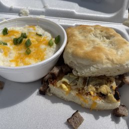 Egg and sausage biscuit with grits Egg and sausage biscuit with grits