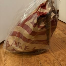 Bag of dozen or so bagels Bag of dozen or so bagels