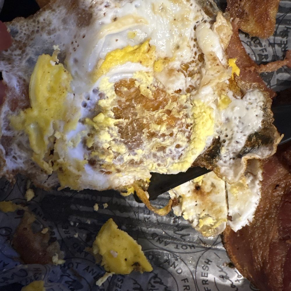 Fried extremely hard. There is no way to eat this egg! Fried extremely hard. There is no way to eat this egg!