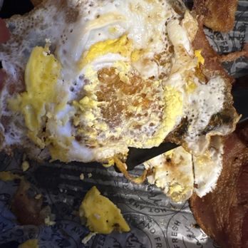 Yonder Brunch & Vibes - Fried extremely hard. There is no way to eat this egg! - Breakfast & Brunch Near Me - Youngstown, Ohio Yonder Brunch & Vibes - Fried extremely hard. There is no way to eat this egg! - Breakfast & Brunch Near Me - Youngstown, Ohio