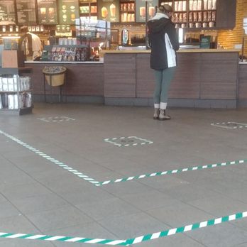 Starbucks - a woman standing in a coffee shop - Coffee & Tea Near Me - Richmond, British Columbia Starbucks - a woman standing in a coffee shop - Coffee & Tea Near Me - Richmond, British Columbia