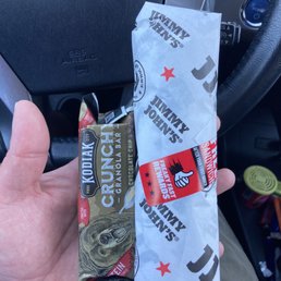$8.00 overpriced tiny sandwich! Used a granola bar for scale and to compare it to their 8" #4 Turkey, THAT DOESN'T INCLUDE CHEESE!