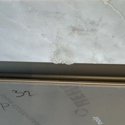 Broken slab left with glue on it. Never returned to fix it! Broken slab left with glue on it. Never returned to fix it!