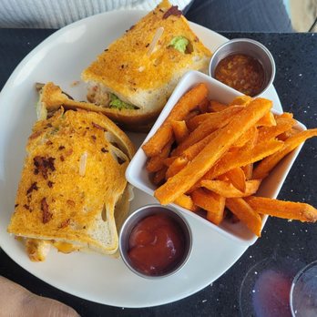 Lalla Grill Oceanside - sandwich with sweet potato fries - Seafood Near Me - Monterey, California Lalla Grill Oceanside - sandwich with sweet potato fries - Seafood Near Me - Monterey, California