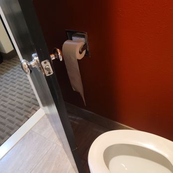 Quality Inn Buellton - Solvang - This is a photo of how close the door is to the toilet. The door needs to be closed so that it won't hit your knees. - Hotels Near Me - Buellton, California Quality Inn Buellton - Solvang - This is a photo of how close the door is to the toilet. The door needs to be closed so that it won't hit your knees. - Hotels Near Me - Buellton, California