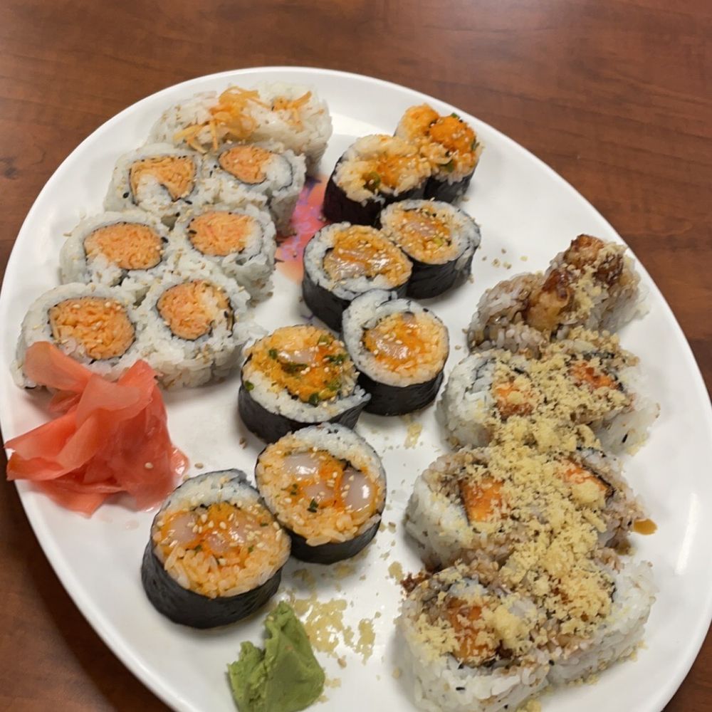 left to right: spicy crab, spicy scallop (seaweed outside), sweet potato roll left to right: spicy crab, spicy scallop (seaweed outside), sweet potato roll
