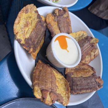 Cayo Coco Rum Bar & Restaurante - Tostones served with cheese dip - Bars Near Me - Birmingham, Alabama