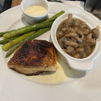 Stubrik's Steakhouse - Chilean Sea Bass, asparagus & sautéed mushrooms. - Steakhouses Near Me - Fullerton, California Stubrik's Steakhouse - Chilean Sea Bass, asparagus & sautéed mushrooms. - Steakhouses Near Me - Fullerton, California