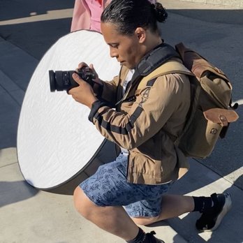 Mason Simmons Visual - Mason and his wife and assistant Erandeny at a photoshoot. - Videographers Near Me Mason Simmons Visual - Mason and his wife and assistant Erandeny at a photoshoot. - Videographers Near Me