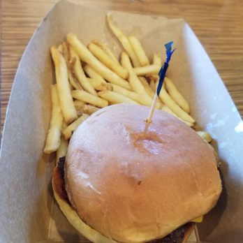 Jimmy Hula's - Kids burger came with a cookie almost as big as the burger! #happy kid - Seafood Near Me - Winter Park, Florida