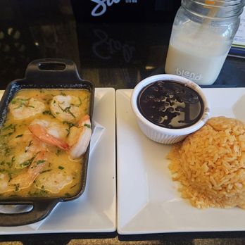 Blend - Camarones al ajillo with a side of yellow rice & beans - Latin American Near Me - Long Island City, New York