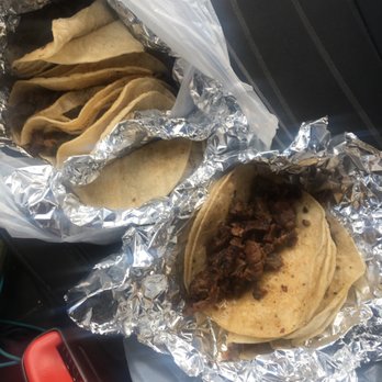 El Taconazo - A bunch of fajita tacos preparing to be dressed up with toppings (also taken in my car in the passenger seat) - Tacos Near Me - Houston, Texas El Taconazo - A bunch of fajita tacos preparing to be dressed up with toppings (also taken in my car in the passenger seat) - Tacos Near Me - Houston, Texas