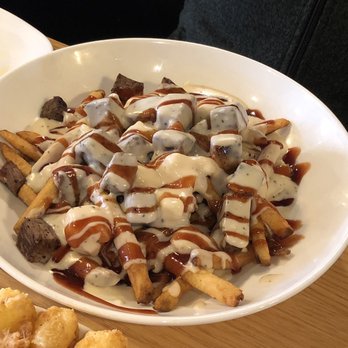 One Bourbon - Poutine - American Near Me - Grand Rapids, Michigan One Bourbon - Poutine - American Near Me - Grand Rapids, Michigan