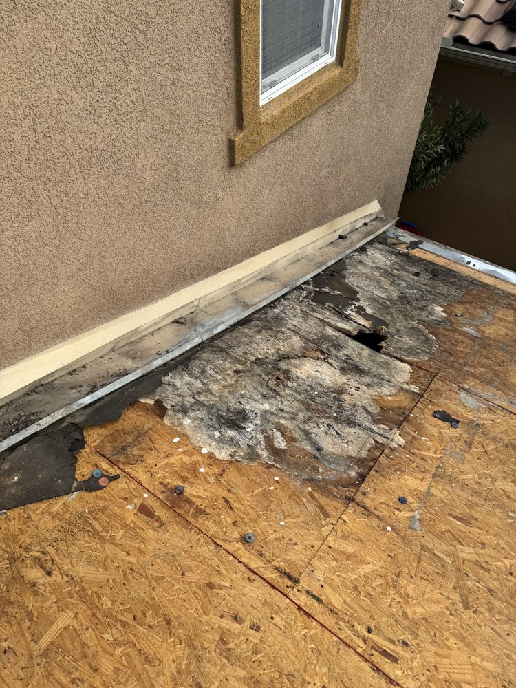 Slide of Spootless Roofing