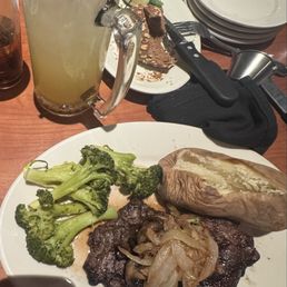 Steak, bake potato and broccoli