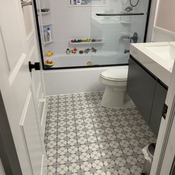 CJ Services - a bathroom with a shower and a toilet - Heating & Air Conditioning/HVAC Near Me CJ Services - a bathroom with a shower and a toilet - Heating & Air Conditioning/HVAC Near Me
