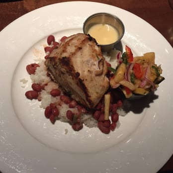 RumFish Grill - Jerk swordfish, coconut rice and bean, pineapple salsa, rum butter - Seafood Near Me - St Pete Beach, Florida