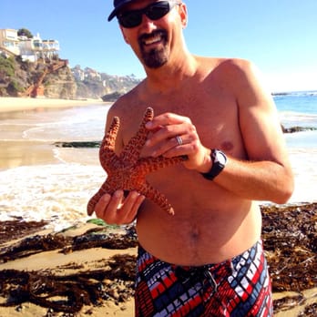 Thousand Steps Beach - I know you are not allowed to pick up any marine life, but Patrick here needed help finding Sponge Bob Square Pants - Beaches Near Me - Laguna Beach, California