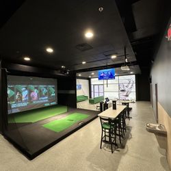 X-Golf Madison - Our private party room. Great for smaller events or as a supplement to a larger one!