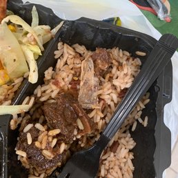 a meal of rice, meat and vegetables