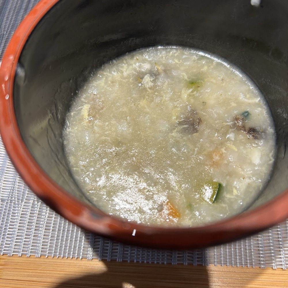 Dongwon Sushi & Tuna - Congee I think, with bits of seafood - Sushi Bars Near Me - Flushing, New York