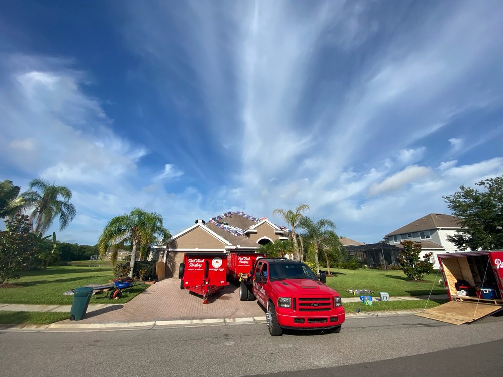 Slide of Red Truck Roofing