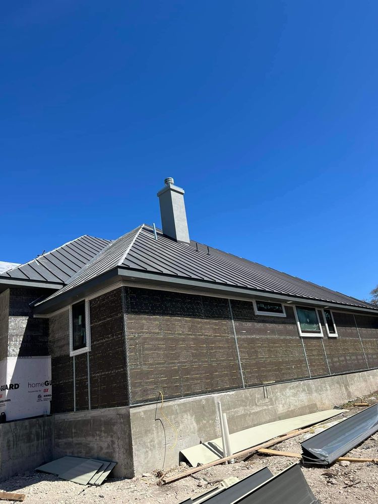 Slide of Sagan Commercial Roofing