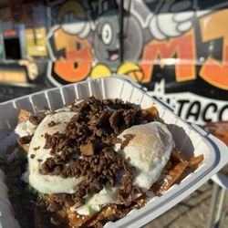 Da Bomb Fish Taco - Chilaquiles w/ carne asada
