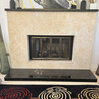 Leader Granite Tile - Ubatuba black and cream granite fireplace. - Kitchen & Bath Near Me - Lakeside, California