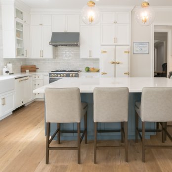 Silva Custom Construction - a kitchen with a large island - General Contractors Near Me