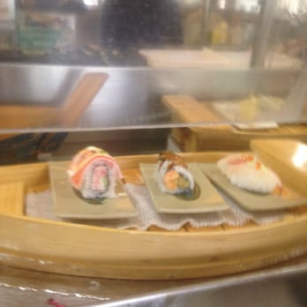 Kobe Sushi Buffet - 5/22/2016 Kobe sushi buffet different variety of sushi on the boat - Sushi Bars Near Me - Modesto, California