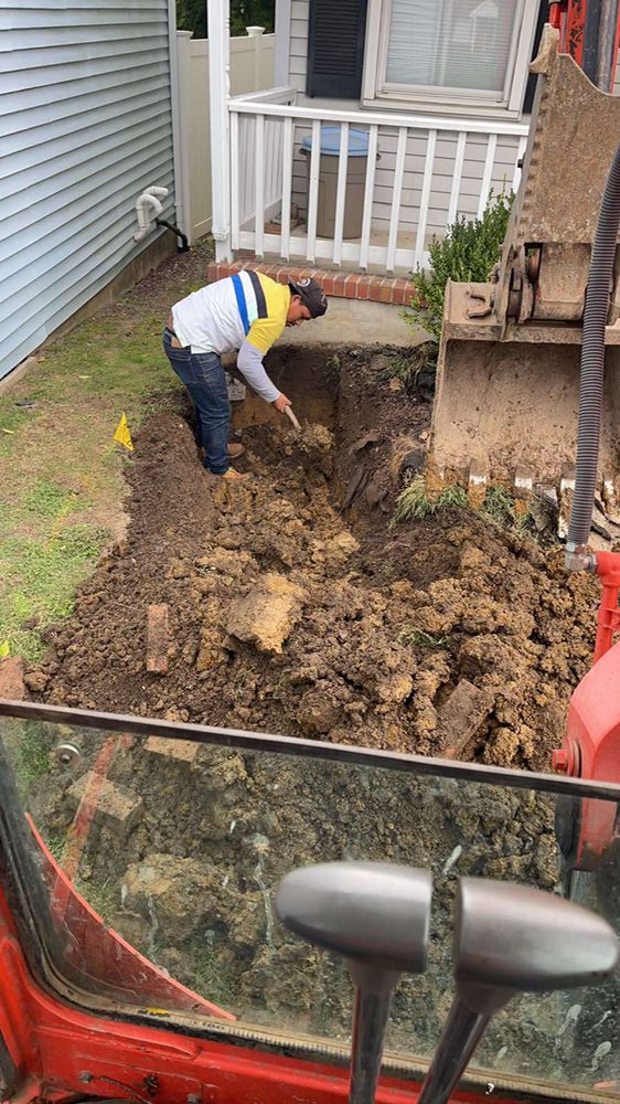 Slide of John’s Sewer Cleaning