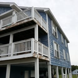 Sherwin-Williams Paint Store - Vinyl siding and wooden railings & beams after a powerwash we will apply 2 coats of Sherwin Williams Duration.Great solid finish