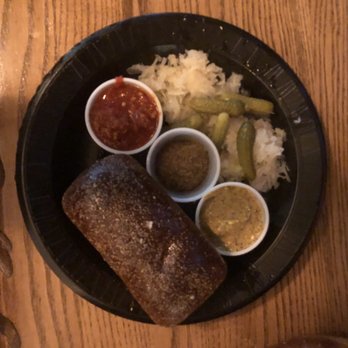 Wild Bear Tavern - Sides for the sausage platter: sauerkraut, dipping sauces, pickles and bread - Breakfast & Brunch Near Me - Pigeon Forge, Tennessee Wild Bear Tavern - Sides for the sausage platter: sauerkraut, dipping sauces, pickles and bread - Breakfast & Brunch Near Me - Pigeon Forge, Tennessee