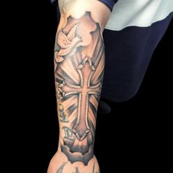 Apollo Tattoo Studio Lounge  - Religious tattoo