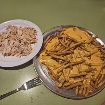 Antojo’s - Idaho nachos but for a picky kid chicken on the side and no veggie toppings - Mexican Near Me - Twin Falls, Idaho