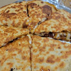 A Bite To Remember - Comes with a marinara base & mozzarella cheese stuffed between two 10" flour tortillas.
Build your own or choose a Specialty Bite.