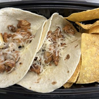 Bubbakoo's Burritos - $9.99 for 2 chicken tacos and stale chips. My kid didn't want toppings but he tore them up. The chicken had some kick. - Mexican Near Me - Morrisville, Pennsylvania