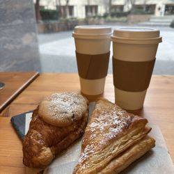 Roggenart European Bakery, Bistro & Cafe - Crookie and Apple Danish. Churro and Tiramisu lattes