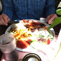 Café Öfre Slotts - Mixed meats, mushroom soup and a view of the counter from our booth.