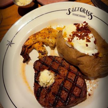 Saltgrass Steak House - Maudeens 9oz Filet, grilled shrimp, and loaded baked potato - Steakhouses Near Me - Grapevine, Texas Saltgrass Steak House - Maudeens 9oz Filet, grilled shrimp, and loaded baked potato - Steakhouses Near Me - Grapevine, Texas