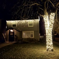 BrightHaus - Truck wrap in warm white. House in icicles